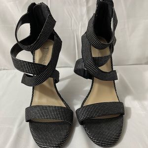 Bejeweled woman’s heel